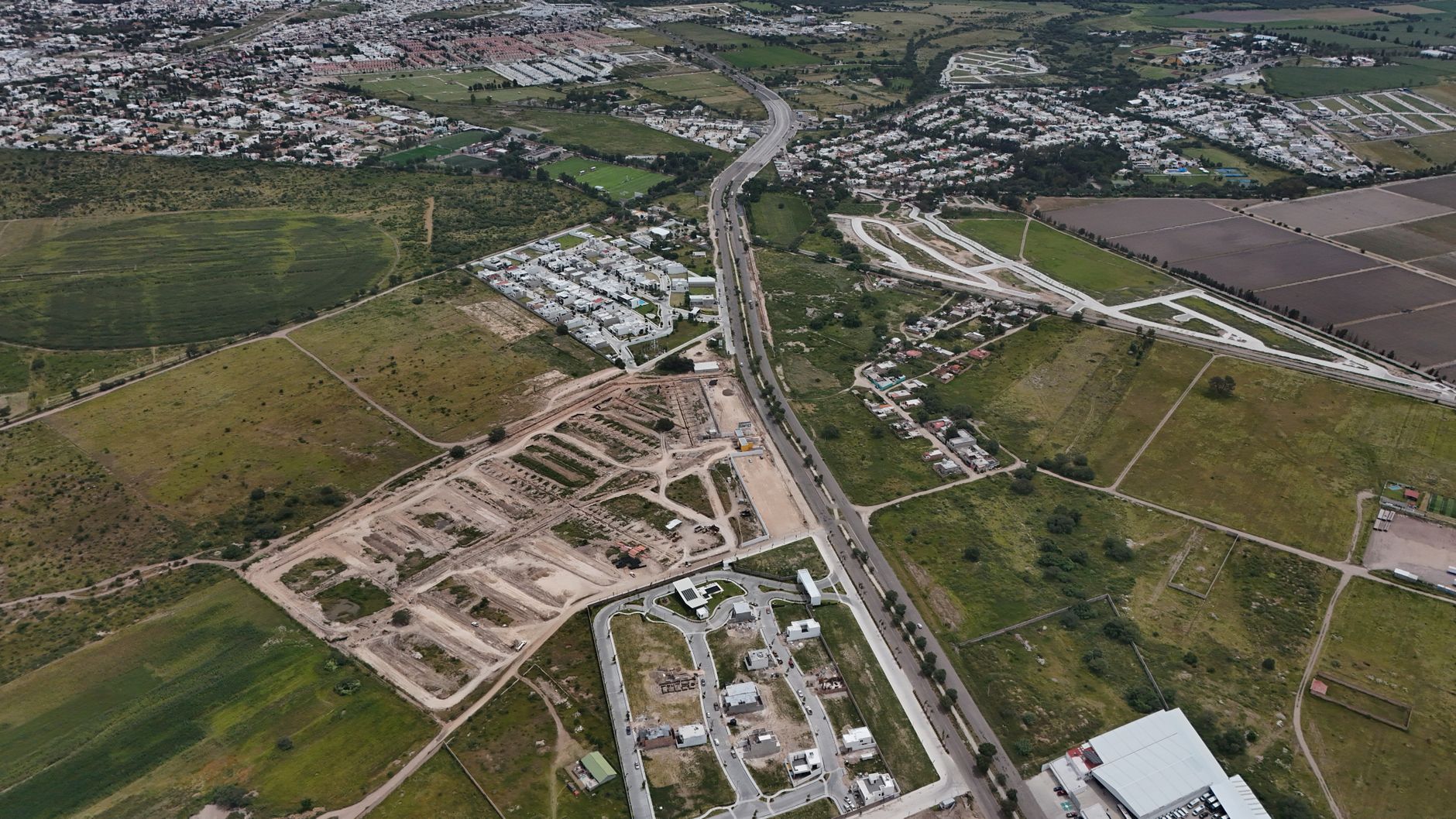 Aerial view of a planned plotted residential development, representative of Dholera SIR